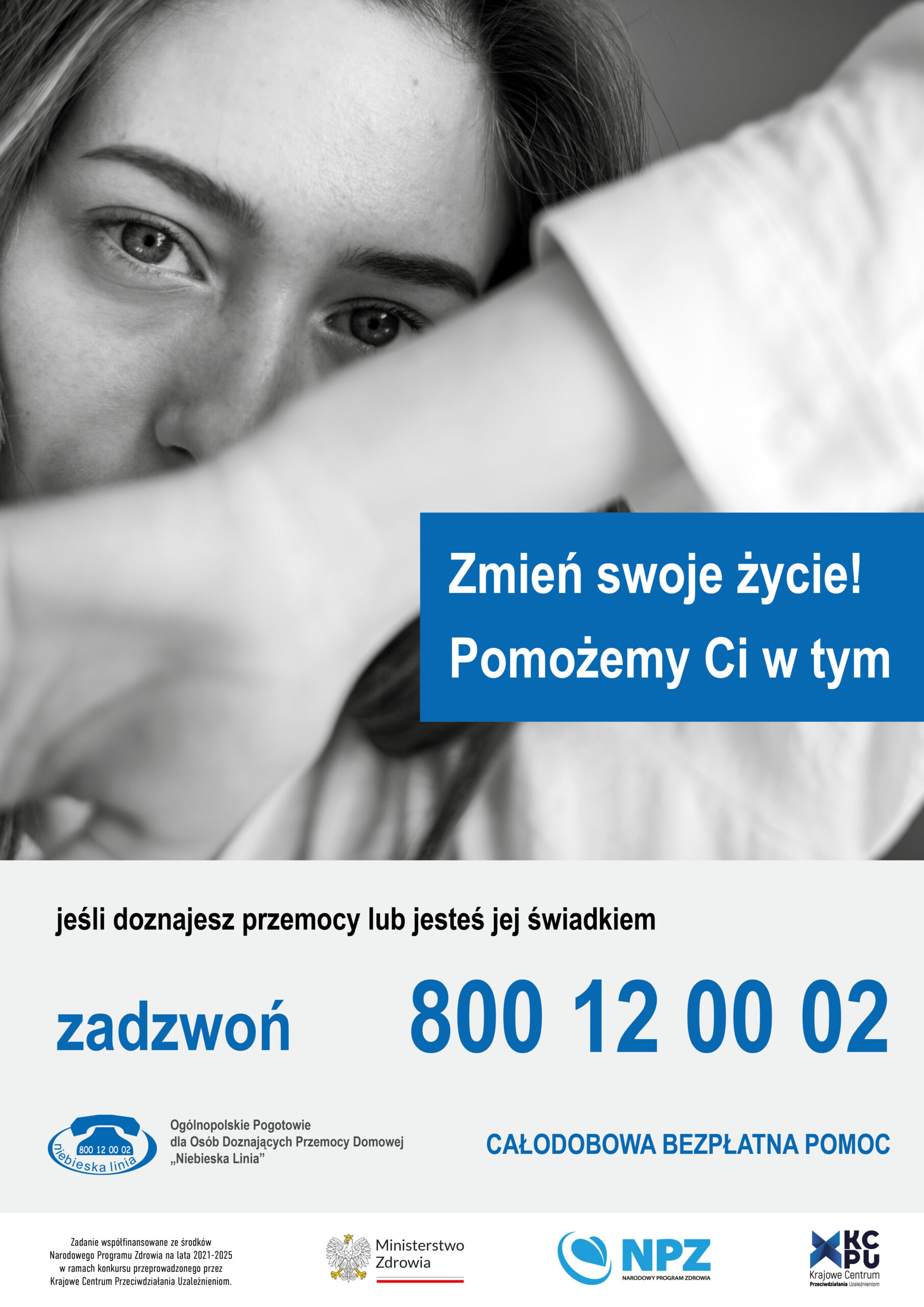 plakat niebieskiej linii z numerem kontaktowym dla osób doznających przemocy lub świadków. Przedstawia kobietę zasłaniająca twarz i nr kontaktowe